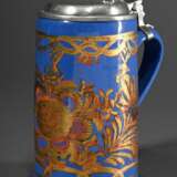 Schrezheimer Walzenkrug mit floraler Goldmalerei auf blau glasiertem Fond, polierter Zinndeckel mit Kugeldrücker und Fußring, Ende 18.Jh., H. 22,5cm, berieben - photo 1