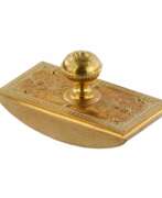 Overview. A heavy paperweight made of bronze and wood, in the style of Napoleon III, by the workshop of F. BARBEDIENNE. 