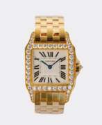 Overview. Cartier. Damen-Armbanduhr 'Santos Demoiselle' mit Brillanten.