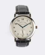 Wrist watches. A. Lange & Söhne. Herren-Armbanduhr '1815' Platin - Full Set.