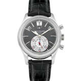 PATEK PHILIPPE. A PLATINUM AUTOMATIC ANNUAL CALENDAR FLYBACK CHRONOGRAPH WRISTWATCH WITH POWER RESERVE AND DAY/NIGHT INDICATION - photo 1
