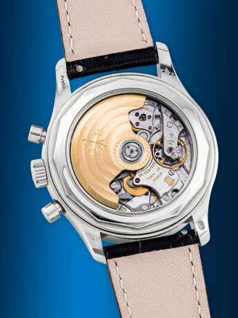 PATEK PHILIPPE. A PLATINUM AUTOMATIC ANNUAL CALENDAR FLYBACK CHRONOGRAPH WRISTWATCH WITH POWER RESERVE AND DAY/NIGHT INDICATION - photo 3