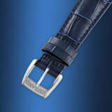 VOUTILAINEN. A VERY RARE PLATINUM LIMITED EDITION WRISTWATCH WITH RETROGRADE DATE - photo 4