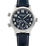 PATEK PHILIPPE. AN 18K WHITE GOLD AUTOMATIC DUAL TIME WRISTWATCH WITH SWEEP CENTRE SECONDS, DUAL DAY/NIGHT INDICATION AND DATE - photo 1