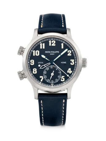 PATEK PHILIPPE. AN 18K WHITE GOLD AUTOMATIC DUAL TIME WRISTWATCH WITH SWEEP CENTRE SECONDS, DUAL DAY/NIGHT INDICATION AND DATE - photo 1