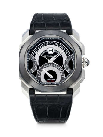 BULGARI. A STAINLESS STEEL AND BLACK CERAMIC AUTOMATIC CHRONOGRAPH WRISTWATCH WITH SWEEP CENTRE SECONDS, JUMP HOUR, RETROGRADE MINUTES AND DATE - photo 1