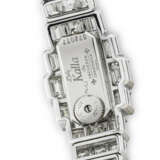 VACHERON CONSTANTIN. A LADY`S MESMERISING AND ATTRACTIVE 18K WHITE GOLD AND EMERALD-CUT DIAMOND-SET BRACELET WATCH - фото 3