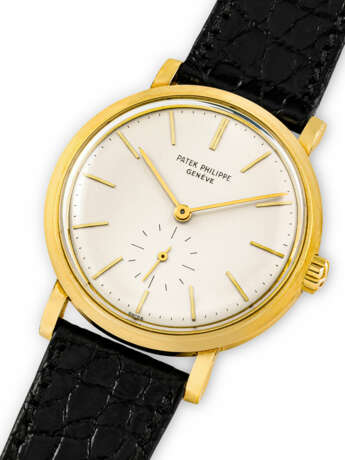 PATEK PHILIPPE. AN 18K GOLD AUTOMATIC WRISTWATCH - photo 2