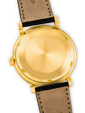 PATEK PHILIPPE. AN 18K GOLD AUTOMATIC WRISTWATCH - photo 3