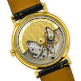PATEK PHILIPPE. AN 18K GOLD AUTOMATIC WRISTWATCH - photo 4