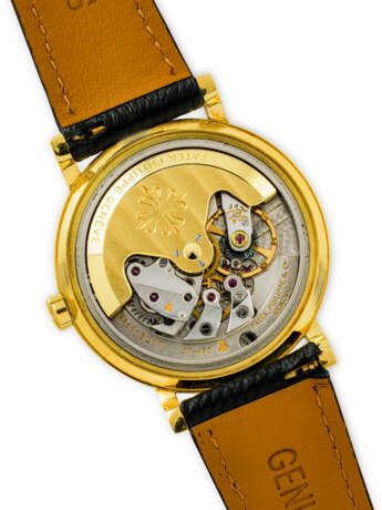 PATEK PHILIPPE. AN 18K GOLD AUTOMATIC WRISTWATCH - photo 4