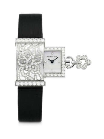 VAN CLEEF & ARPELS. A LADY`S 18K WHITE GOLD AND DIAMOND-SET RECTANGULAR WRISTWATCH - фото 1
