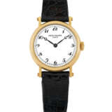 PATEK PHILIPPE. A LADY`S 18K GOLD WRISTWATCH WITH BREGUET NUMERALS - photo 1
