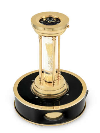 JACOB & CO. A GILT BRASS AND YELLOW GEMSTONE DUAL TIME AND HOURGLASS TIMER - фото 1