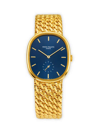 PATEK PHILIPPE. AN ATTRACTIVE 18K GOLD BRACELET WRISTWATCH - Foto 1