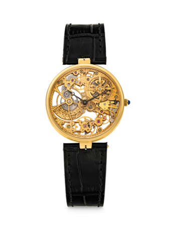 PATEK PHILIPPE. AN 18K GOLD SKELETONISED AUTOMATIC WRISTWATCH - photo 1