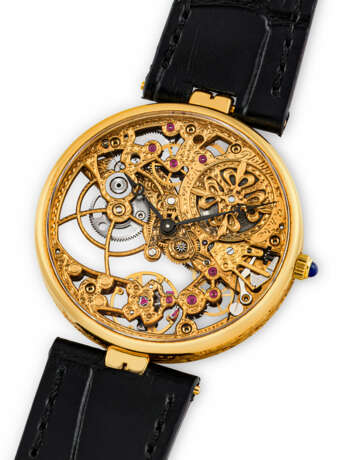 PATEK PHILIPPE. AN 18K GOLD SKELETONISED AUTOMATIC WRISTWATCH - photo 2