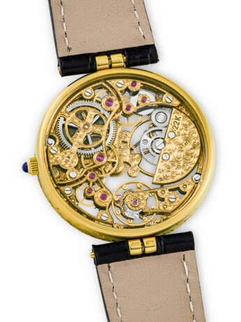 PATEK PHILIPPE. AN 18K GOLD SKELETONISED AUTOMATIC WRISTWATCH - photo 3