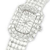 PIAGET. A MESMERISING 18K WHITE GOLD AND BAGUETTE-CUT DIAMOND-SET BRACELET WATCH - фото 2