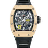 RICHARD MILLE. AN 18K PINK GOLD AND TITANIUM AUTOMATIC SKELETONISED WRISTWATCH WITH SWEEP CENTRE SECONDS, DECLUTCHABLE ROTOR, POWER RESERVE AND DATE - Foto 1