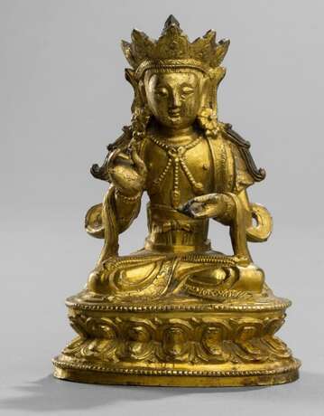 Feuervergoldete Bronze eines Bodhisattva auf einem Lotos - Foto 1
