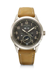 PATEK PHILIPPE, WHITE GOLD ANNUAL CALENDAR DUAL TIME WRISTWATCH, REF. 5326G-001