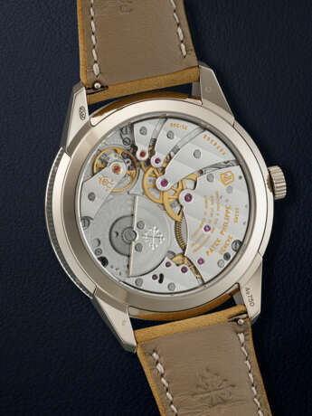 PATEK PHILIPPE, WHITE GOLD ANNUAL CALENDAR DUAL TIME WRISTWATCH, REF. 5326G-001 - photo 3