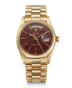 Розовое золото. ROLEX, PINK GOLD 'DAY-DATE', WITH OXBLOOD LACQUERED 'STELLA' DIAL, REF. 1803