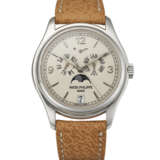 PATEK PHILIPPE, WHITE GOLD ANNUAL CALENDAR WRISTWATCH, REF. 5146G-001 - фото 1