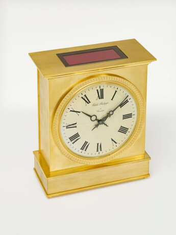 PATEK PHILIPPE, GILDED BRASS SOLAR DESK CLOCK - фото 1