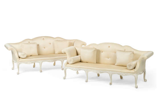 A PAIR OF EARLY GEORGE III CREAM-PAINTED SOFAS - photo 1