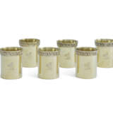 A SET OF SIX GEORGE III SILVER-GILT BEAKERS - photo 1