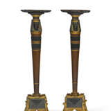 A PAIR OF EGYPTIAN REVIVAL MAHOGANY, PARCEL-EBONIZED, AND PARCEL-GILT TORCHERES - photo 2