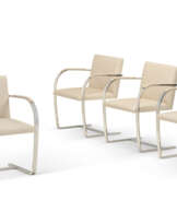 A SET OF FOUR CHROMED FLAT STEEL 'BRNO' ARMCHAIRS