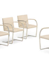 A SET OF FOUR CHROMED FLAT STEEL 'BRNO' ARMCHAIRS