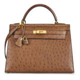 A MARRON OSTRICH SELLIER KELLY 32 WITH GOLD HARDWARE - photo 1