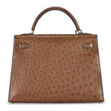 A MARRON OSTRICH SELLIER KELLY 32 WITH GOLD HARDWARE - photo 3