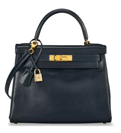 A BLEU INDIGO CALF BOX LEATHER RETOURNÉ KELLY 28 WITH GOLD HARDWARE. - photo 1