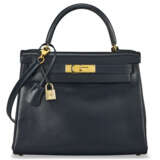 A BLEU INDIGO CALF BOX LEATHER RETOURNÉ KELLY 28 WITH GOLD HARDWARE. - photo 1