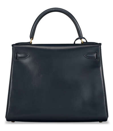 A BLEU INDIGO CALF BOX LEATHER RETOURNÉ KELLY 28 WITH GOLD HARDWARE. - photo 3
