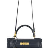A BLEU INDIGO CALF BOX LEATHER RETOURNÉ KELLY 28 WITH GOLD HARDWARE. - photo 4