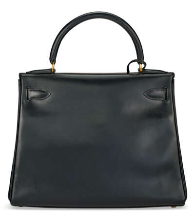 A BLACK CALF BOX LEATHER RETOURNÉ KELLY 28 WITH GOLD HARDWARE - photo 3