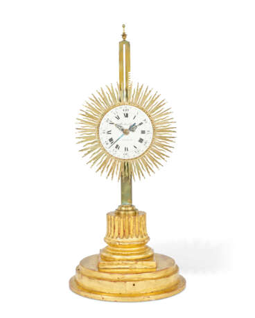 A LOUIS XV GILT-BRASS AND GILTWOOD SUNBURST RACK TIMEPIECE CLOCK - фото 1
