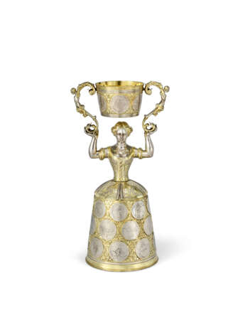 A RARE GERMAN PARCEL-GILT SILVER COIN-SET LARGE WAGER CUP OR JUNGFERNBECHER - фото 1