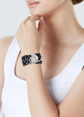 CARTIER ONYX AND DIAMOND 'PANTHÈRE' HIGH JEWELLERY BRACELET/WATCH - photo 6