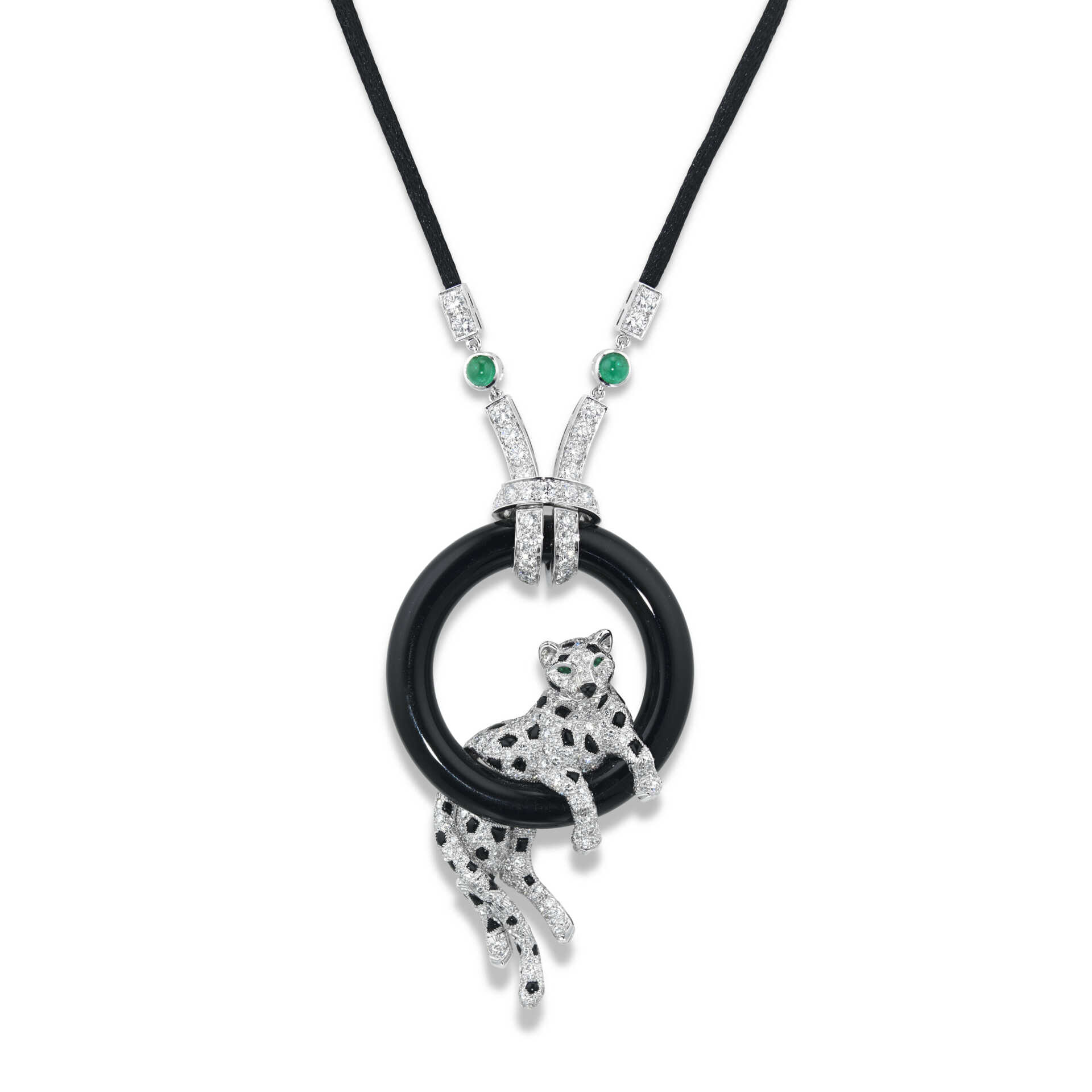 CARTIER ONYX, DIAMOND AND EMERALD 'PANTHÈRE DE CARTIER' PENDENT NECKLACE