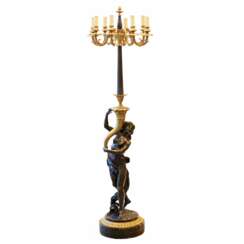 Lampadaire fran&ccedil;ais en bronze dore et patine. Le tournant des XIXe et XXe si&egrave;cles. 