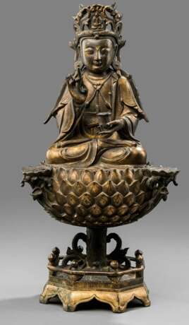 Feuervergoldete Bronze des Guanyin auf einem Lotos - фото 1