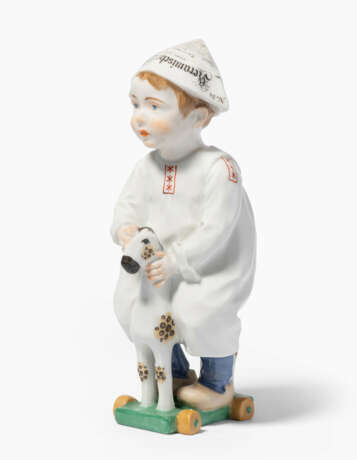 Meissen, Figur "Kind mit Zeitungsmütze, auf einem Holzpferd reitend". - Foto 1