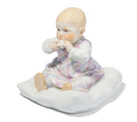Meissen, Figur "Kind auf einem Kissen sitzend".